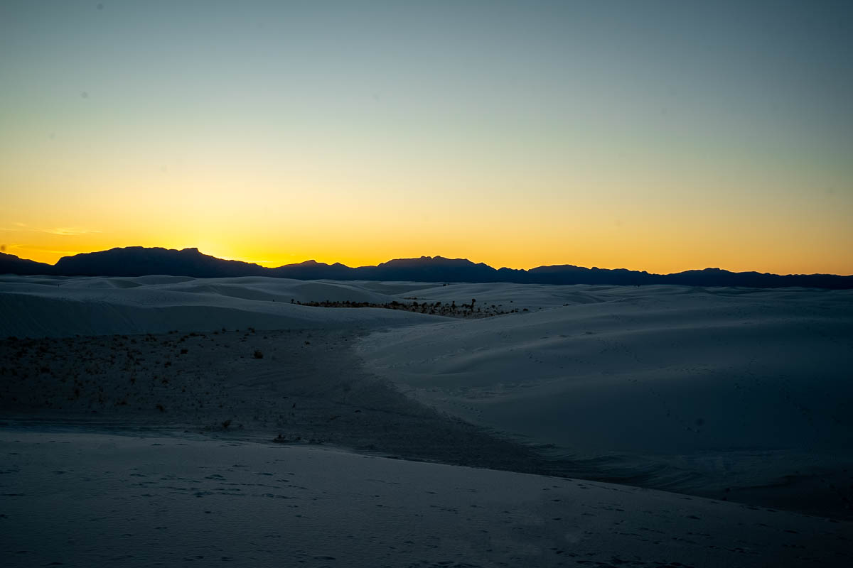 Sunset over the San Andres Mountains over the Alkali Flat Trail in White Sands National Park in New Mexico