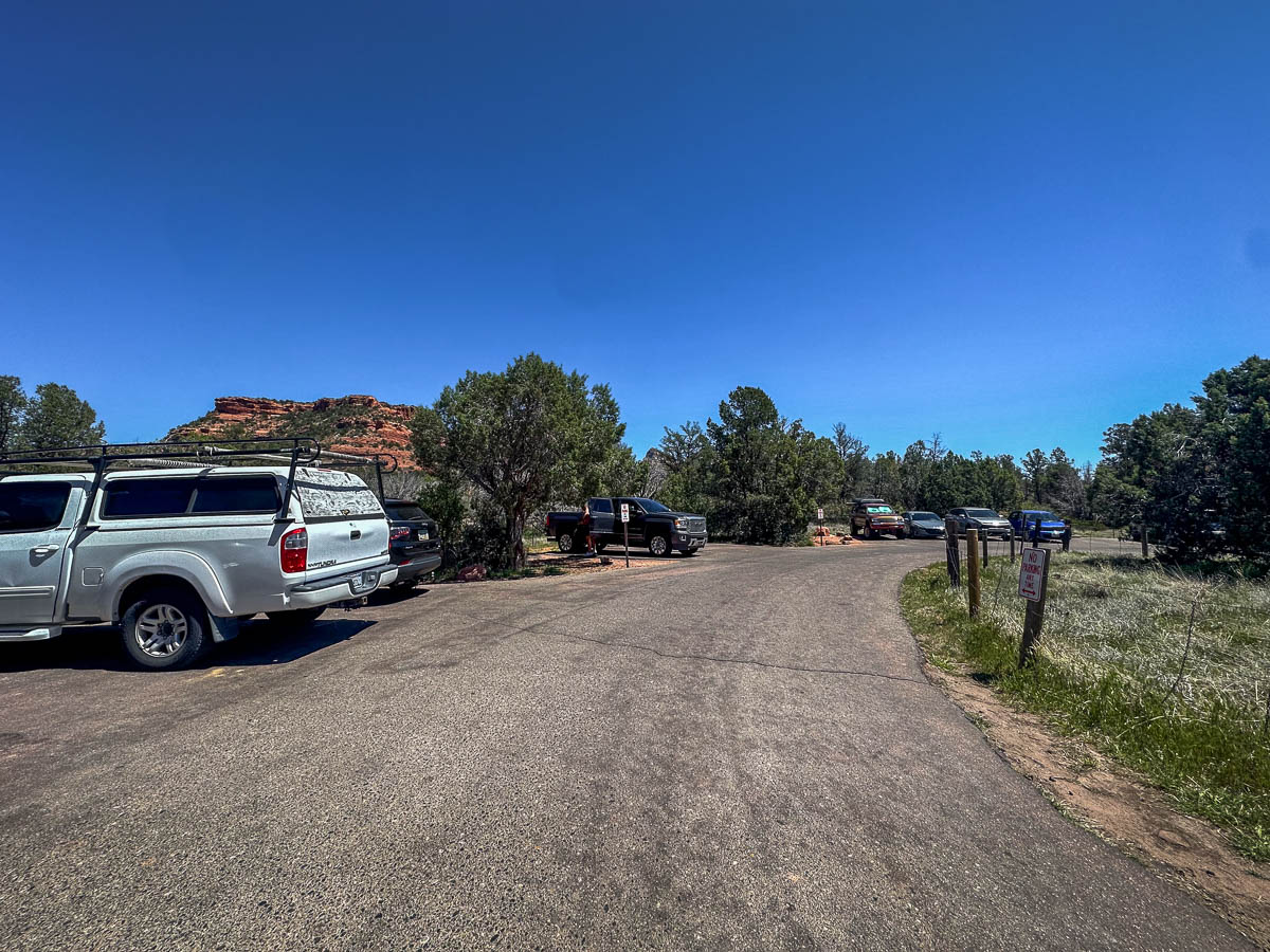 Cars parked in the lot for Boynton Canyon trailhead in Sedona, Arizona