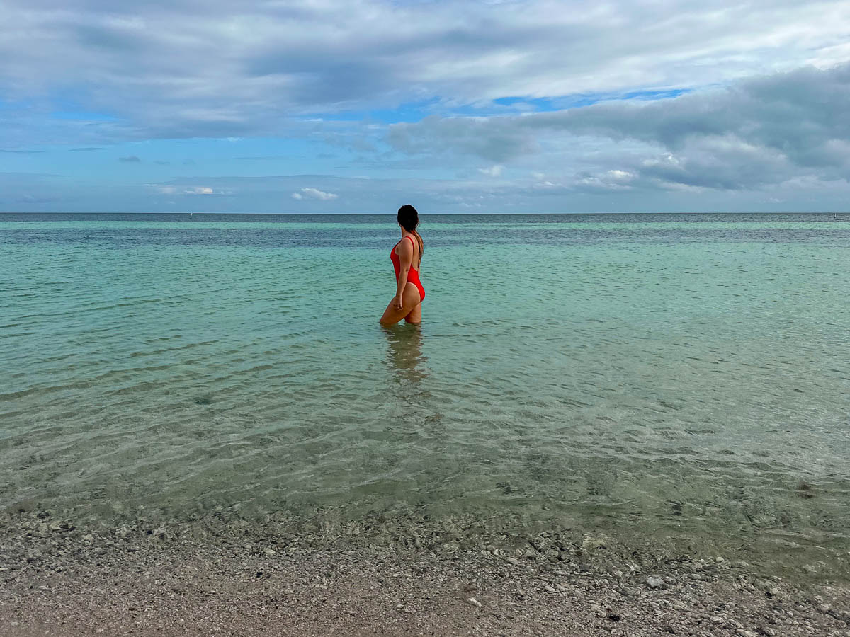 Woman standing in the water at Bahia Honda State Park in Big Pine Key in the Florida Keys in Florida