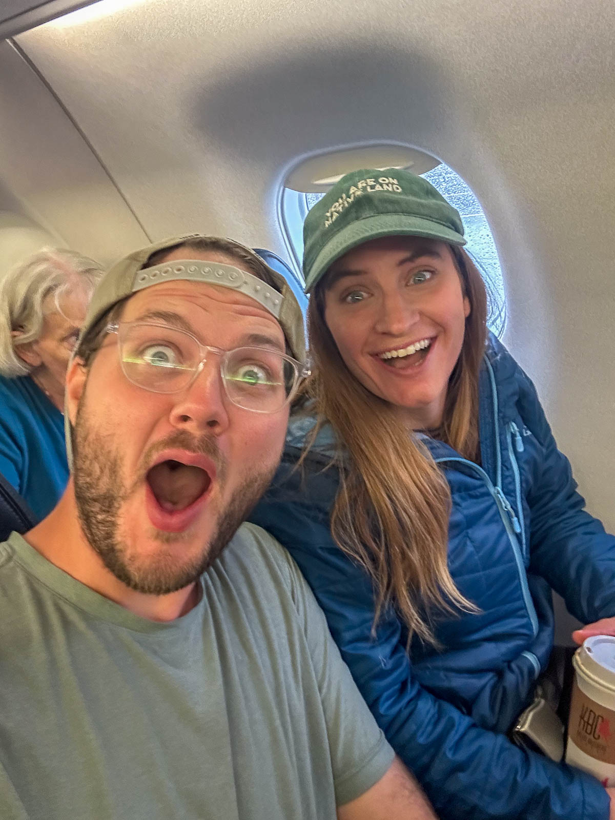 Couple smiling on an Alaska Air flight to King Salmon, Alaska