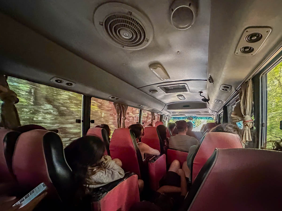 People sitting on a shuttle to Semuc Champey, Guatemala