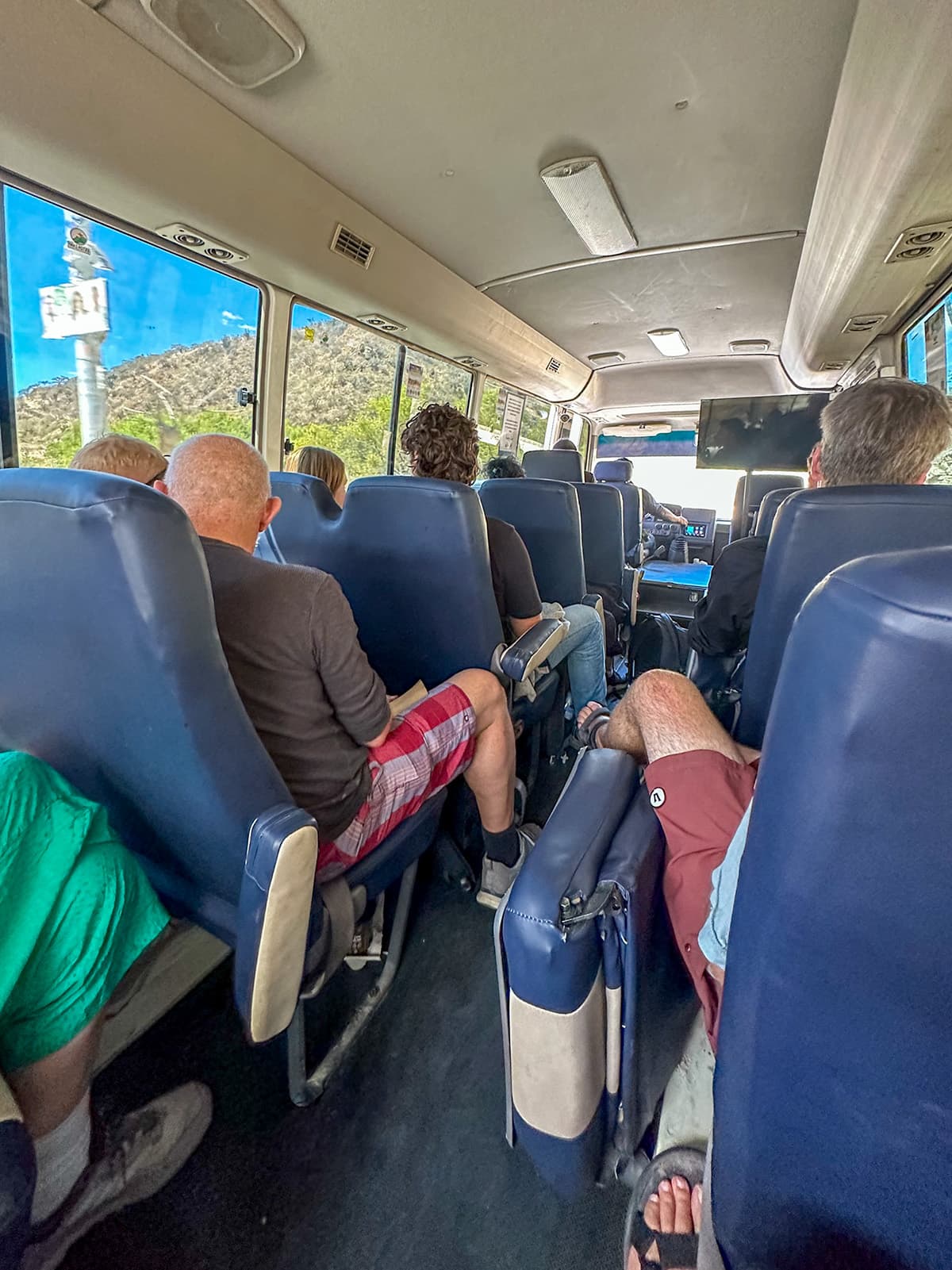 People sitting on a shuttle in Guatemala