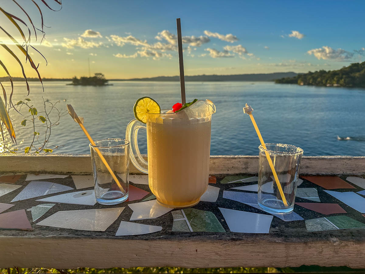 Pitcher of margarita on a counter overlooking Lake Peten in Flores, Guatemala