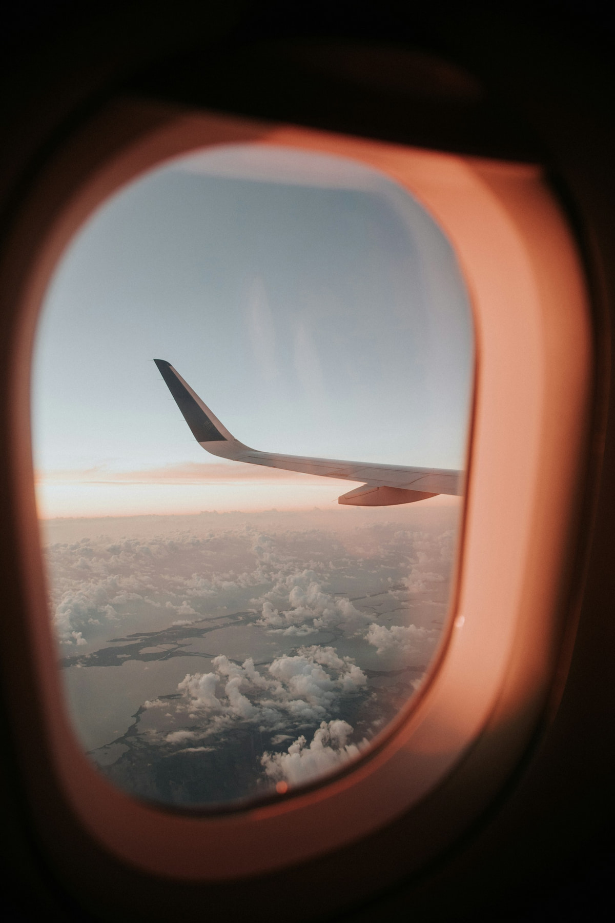 View from an airplane seat at sunset