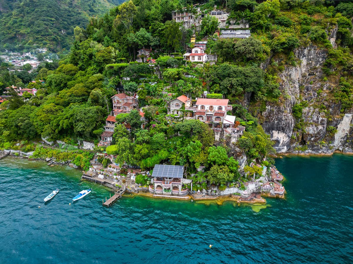 Aerial view of Casa del Mundo built into a cliffside on Lake Atitlan, Guatemala