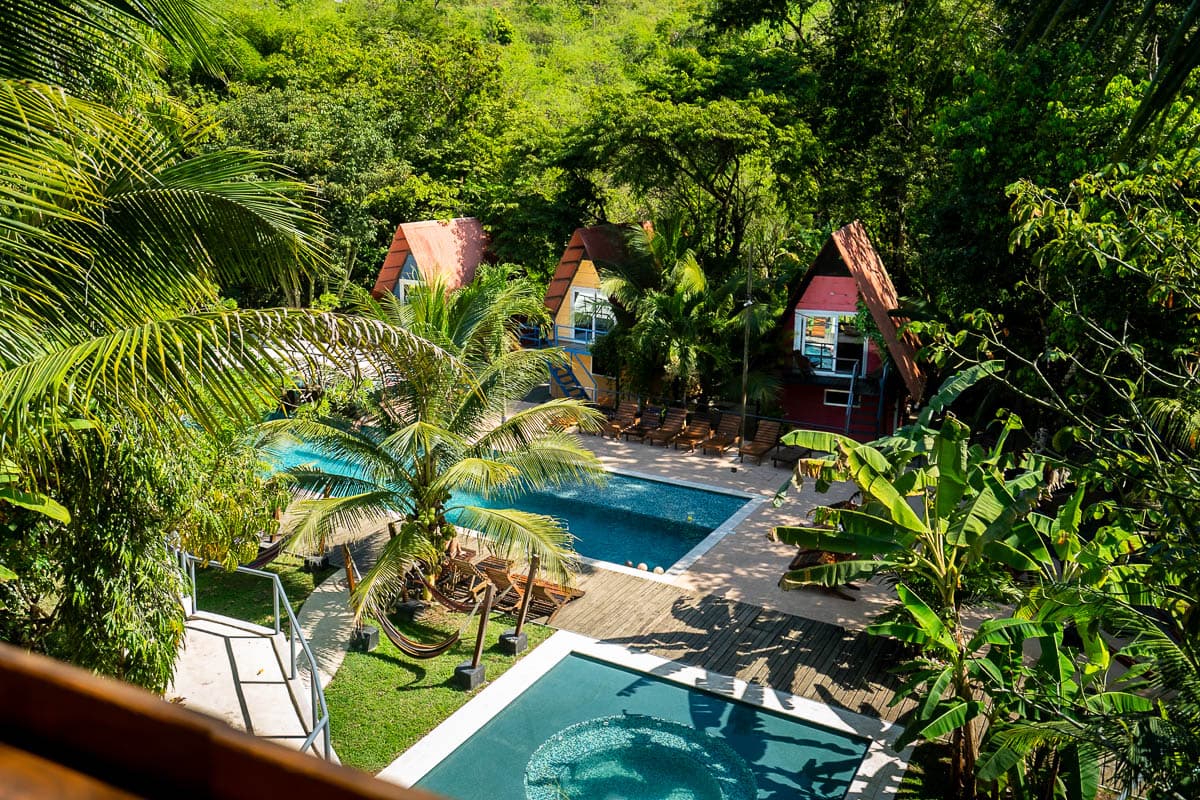 View of cabins and pools at Greengos Hotel near Semuc Champey, Guatemala