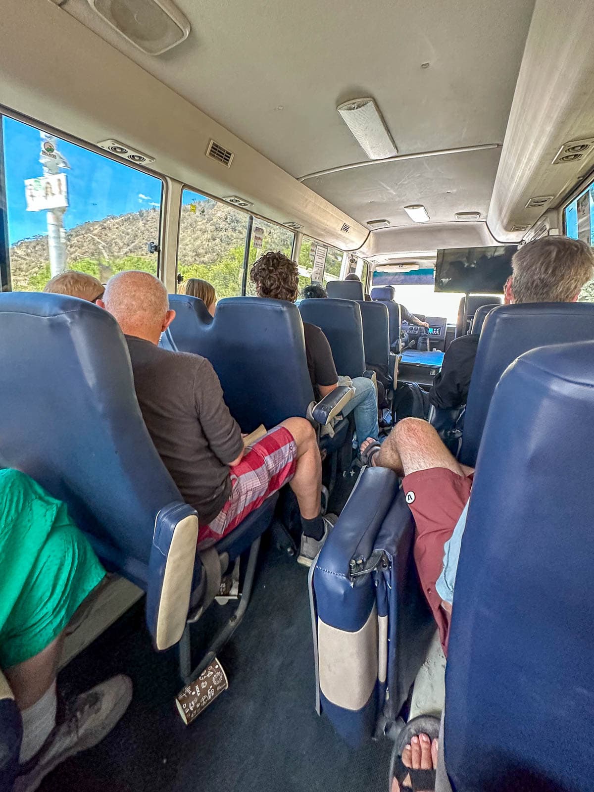 People sitting on a shuttle from Lake Atitlan to Lanquin, Guatemala