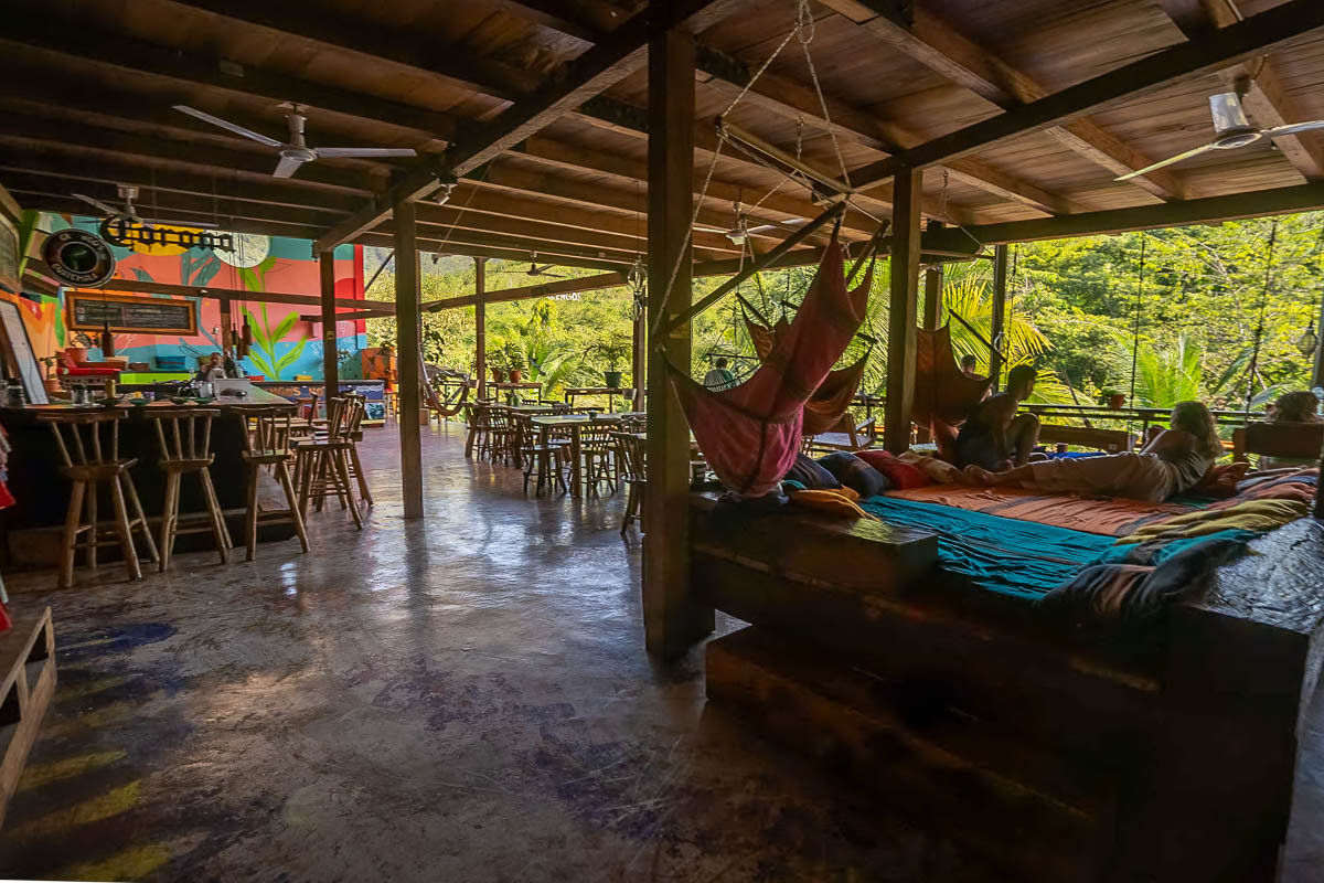 Restaurant and bar area with the jungle in the background of Greengos near Semuc Champey, Guatemala