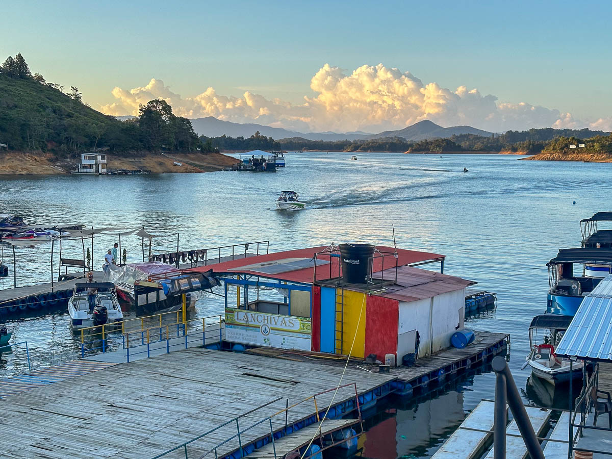 Boat driving near the harbor in Guatape, Colombia