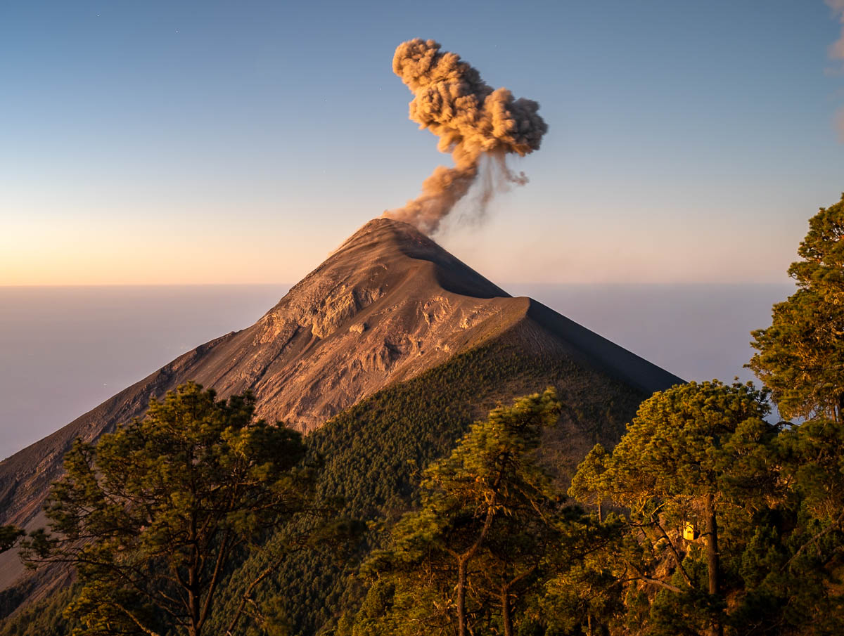 View of Fuego Volcano erupting at sunrise from the Acatenango Hike in Guatemala