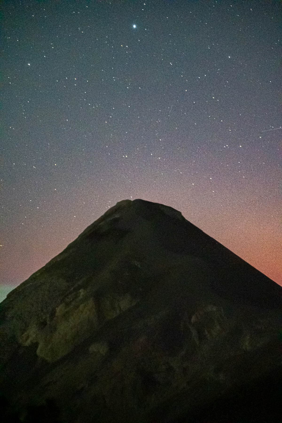 Starry night sky above Fuego Volcano along the Acatenango hike in Guatemal