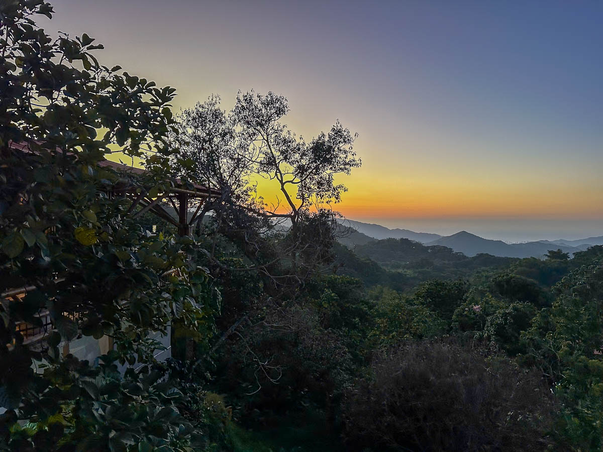 View of the Sierra Nevada mountains at sunset at La Veranda Hotel in Minca, Colombia