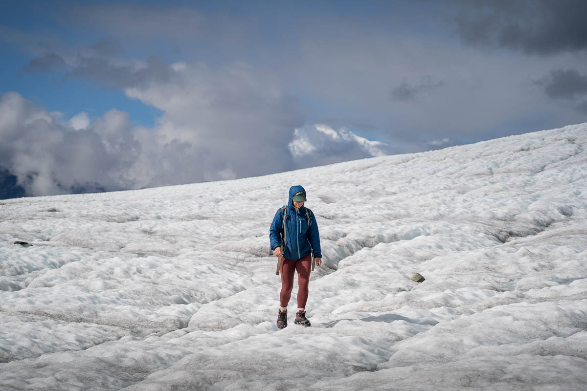 Woman hiking on the Root Glacier in Wrangell St. Elias National Park in Alaska