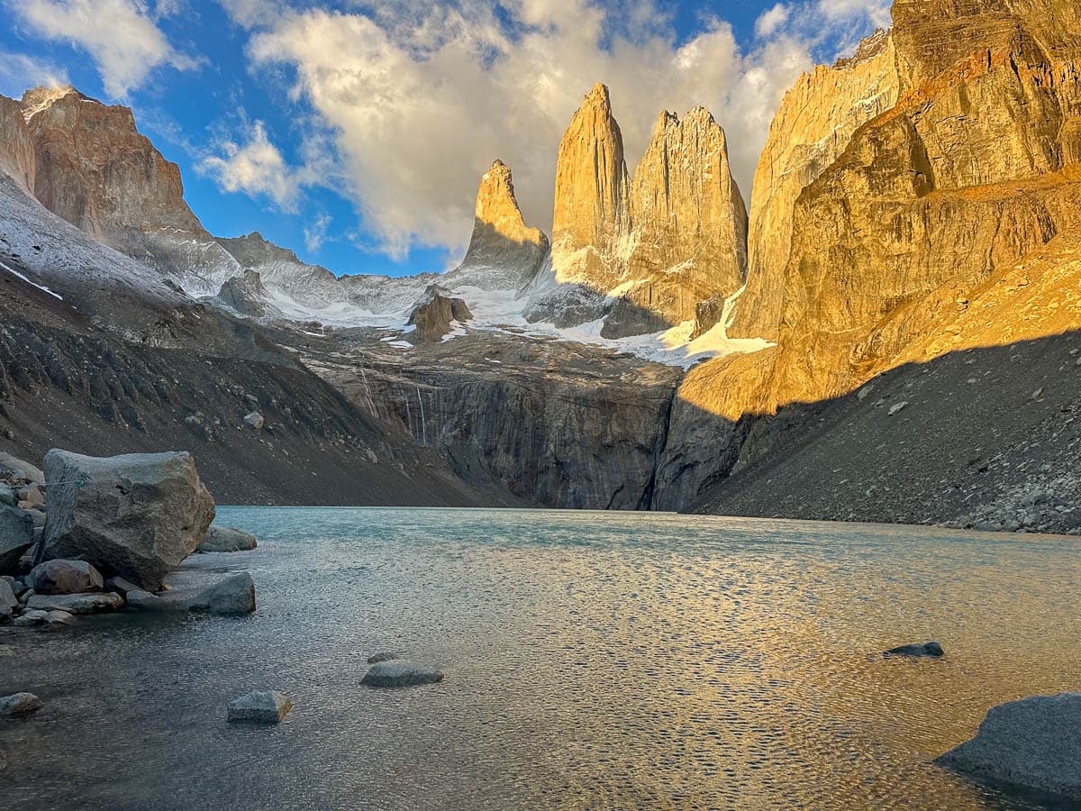 Torres del Paine lit up by the sunrise from Mirador Base las Torres in Torres del Paine National Park