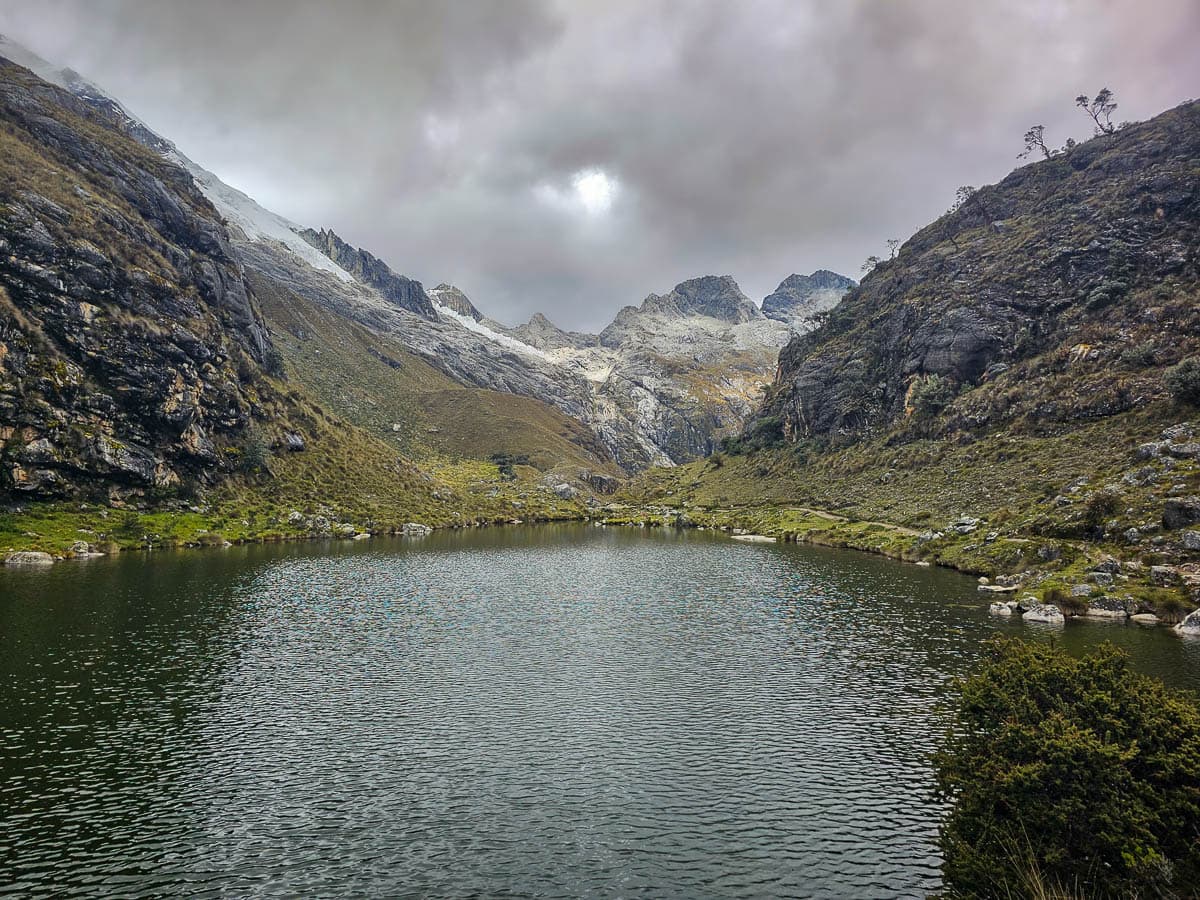 Laguna Esperanza with rugged mountains in the background along the Laguna 69 hike in Huascarán National Park in northern Peru