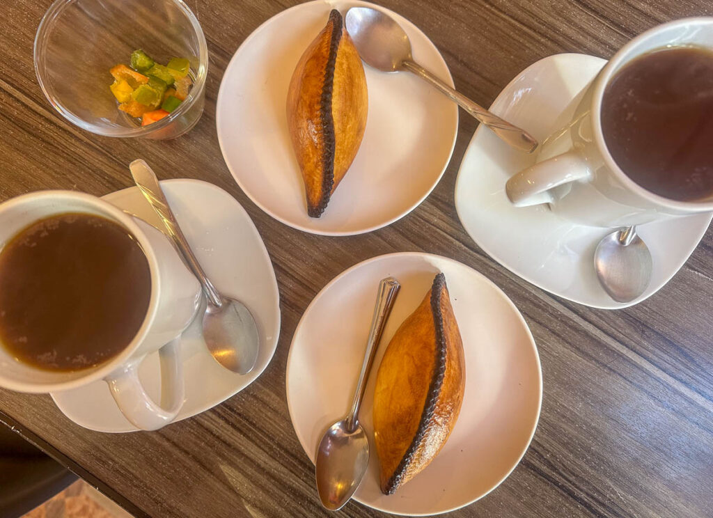 Saltenas and coffee in La Paz, Bolivia
