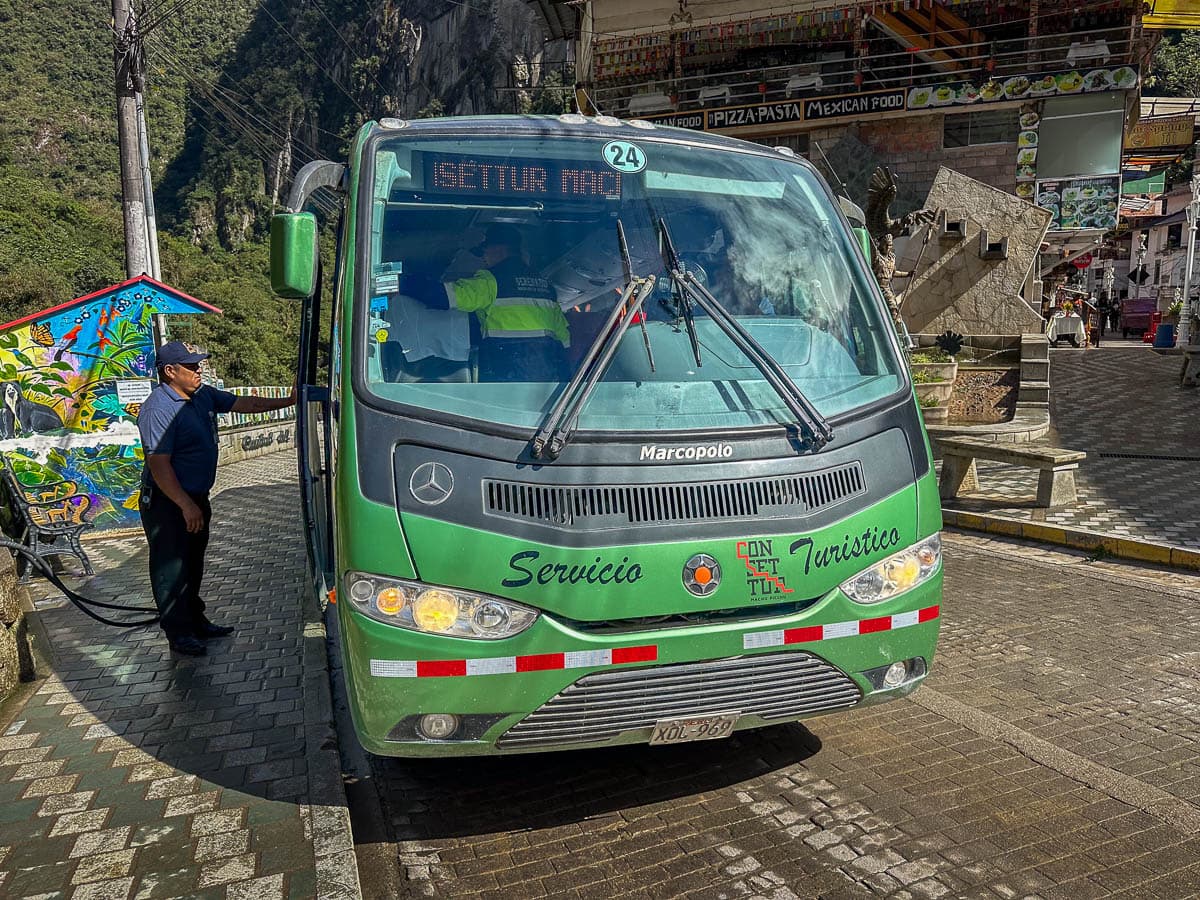 Tourist bus on a street in Aguas Calientes, Peru