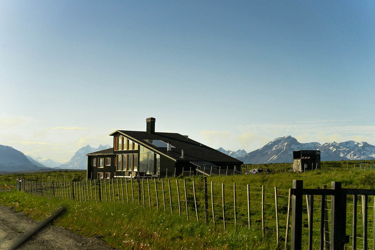 Hotel Simple Patagonia with the Andes Mountains in the background in Puerto Natales, Chile