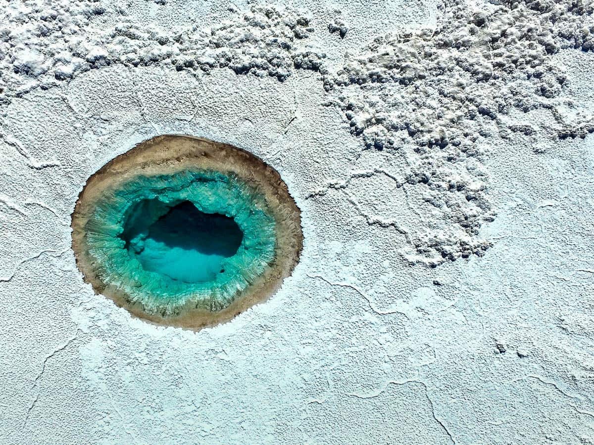 Aerial view of turquoise pool at Lagunas Escondidas de Baltinache in San Pedro de Atacama in the Atacama Desert, Chile