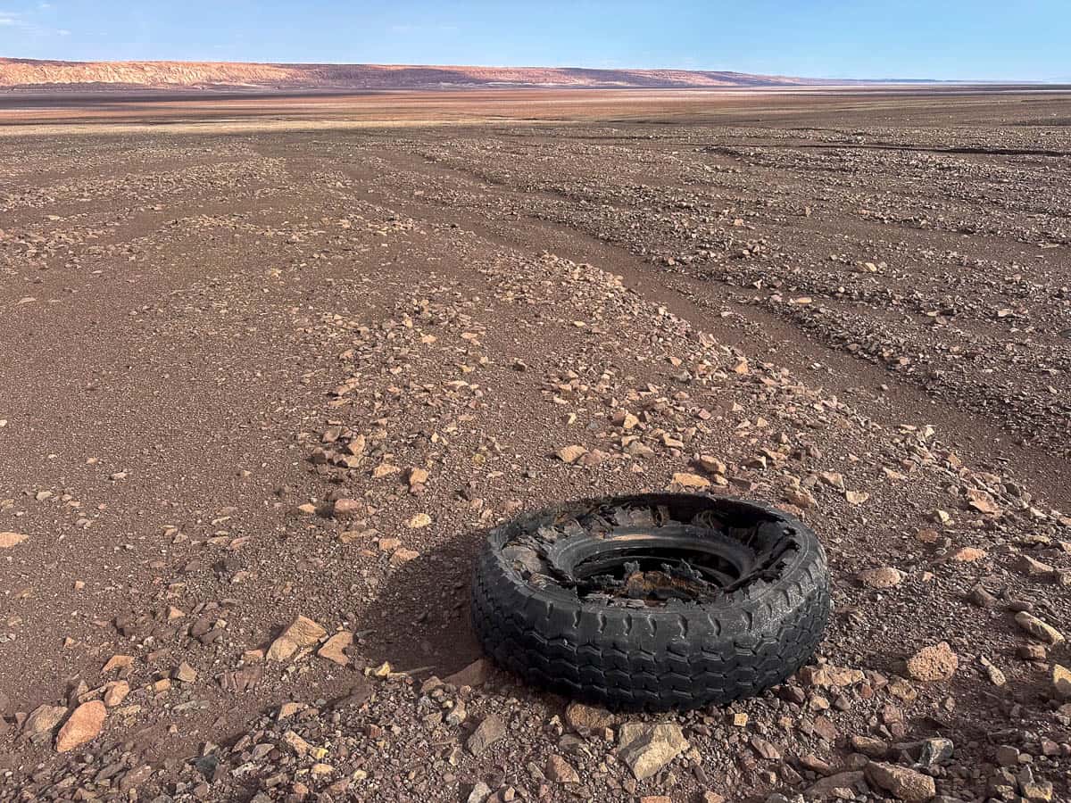 Shredded tire alongside B-241 road driving to Lagunas Escondidas de Baltinache in San Pedro de Atacama in the Atacama Desert, Chile