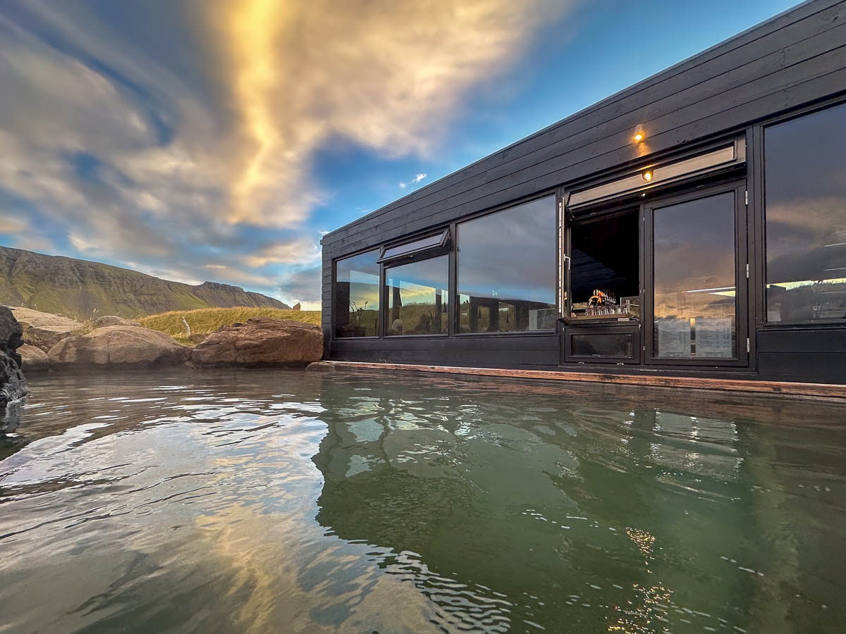 Swim up bar window at a pool at the Hvammsvik Hot Springs in Iceland