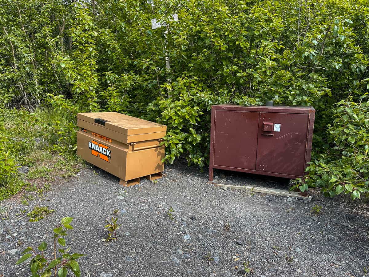 Bear boxes in a forest by the Grewingk Glacier Lake in Kachemak Bay State Park in Alaska