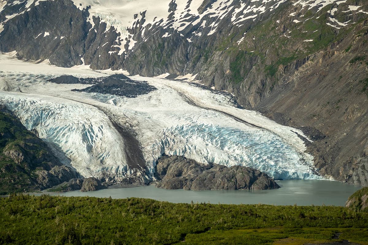 View of Portage Lake with Portage Glacier in the background along the Portage Pass Trail in Whittier, Alaska