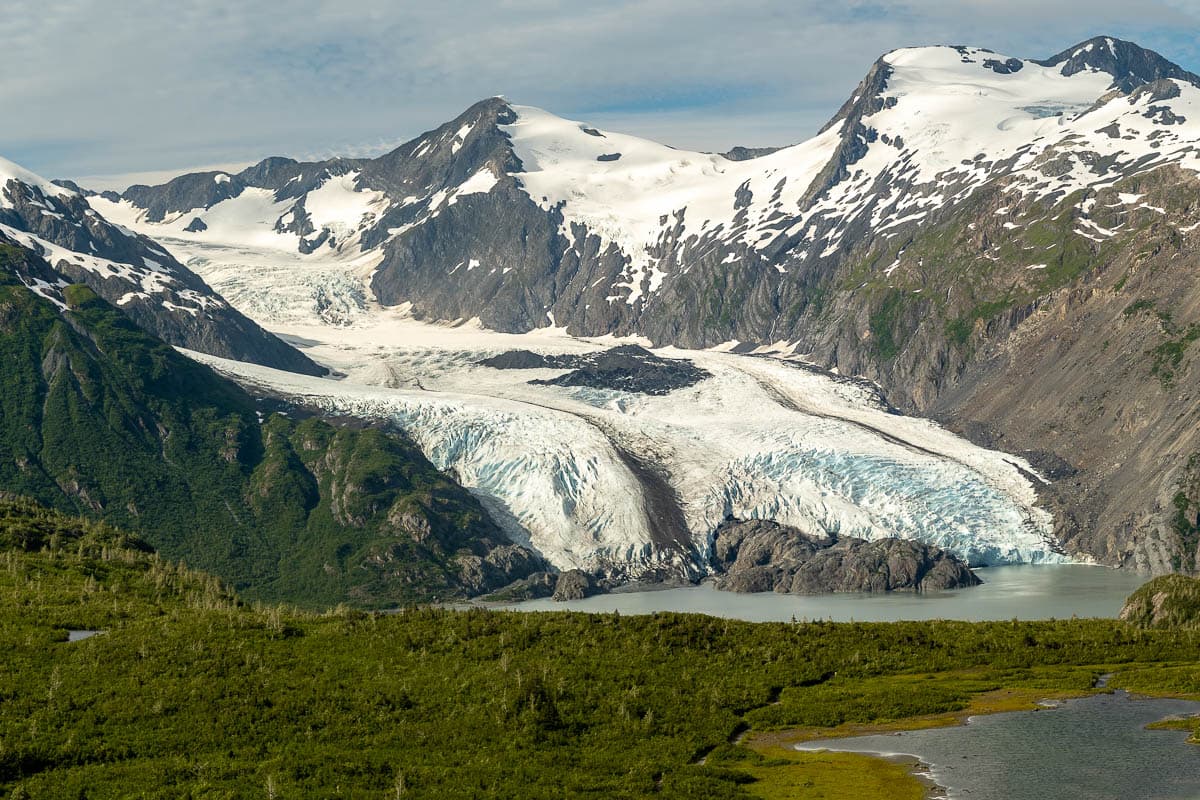 Portage Glacier spilling over the Chugach Mountains along the Portage Pass Trail in Whittier, Alaska