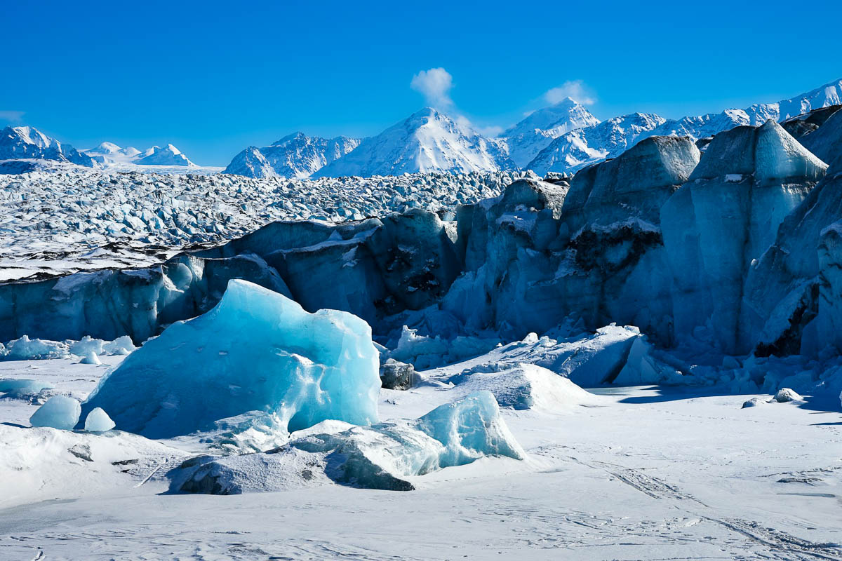 Ice formations on top of the Knik Glacier with the Chugach Mountains near Palmer, Alaska