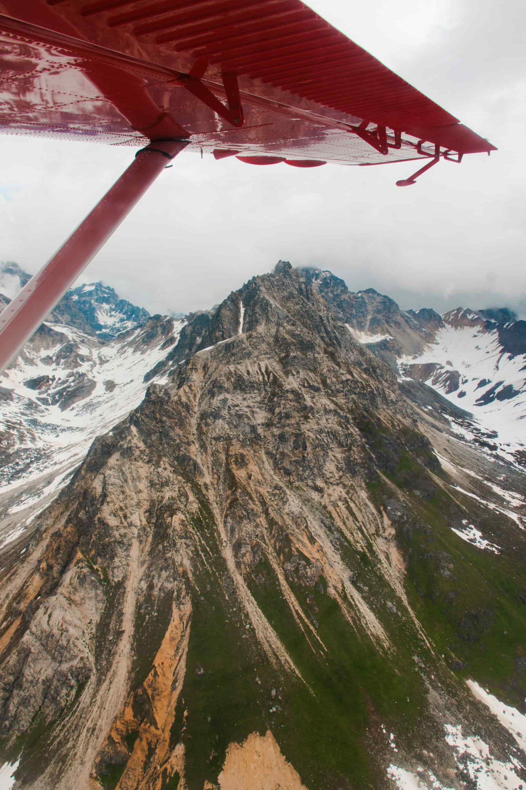 Mount Denali out of a window of a flightseeing tour in Denali National Park, Alaska