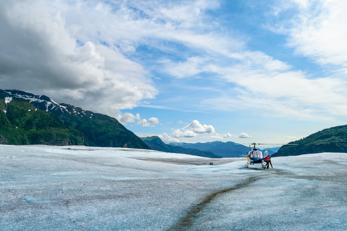 Helicopter landing on a glacier in Alaska