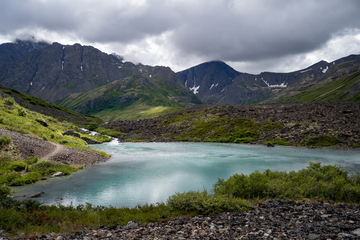 Glacial lake with the Chugach Mountains in the background in Chugach State Park outside of Anchorage, Alaska