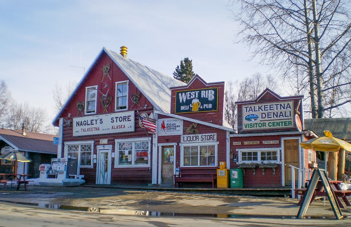 Rustic buildings along a street in Talkeetna, Alaska