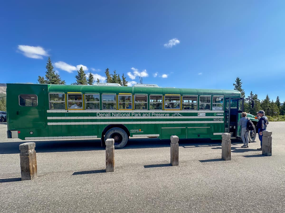 Hikers loading on a hiker shuttle on the Denali National Park at the Savage River