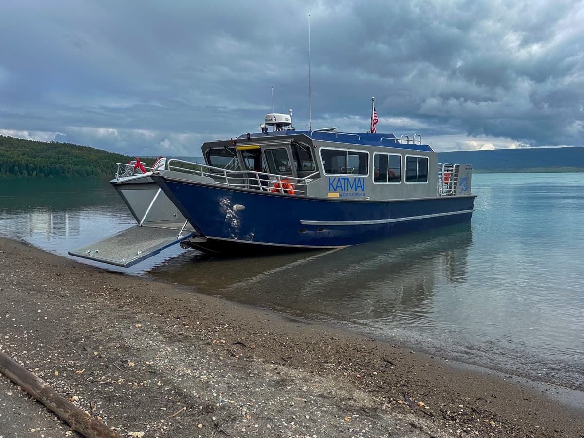 Katmai Water Taxi parked on the Naknek Lake Beach in Katmai National Park in Alaska