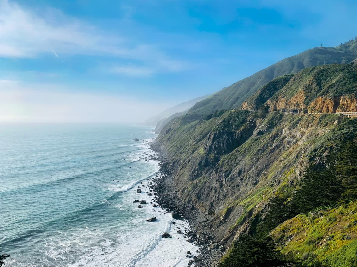 Pacific Coast Highway along a rugged cliffside at Ragged Point in Big Sur, California