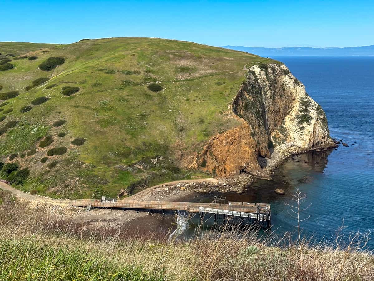Scorpion Cove anchorage surrounded by green hills on Santa Cruz in the Channel Islands National Park in California