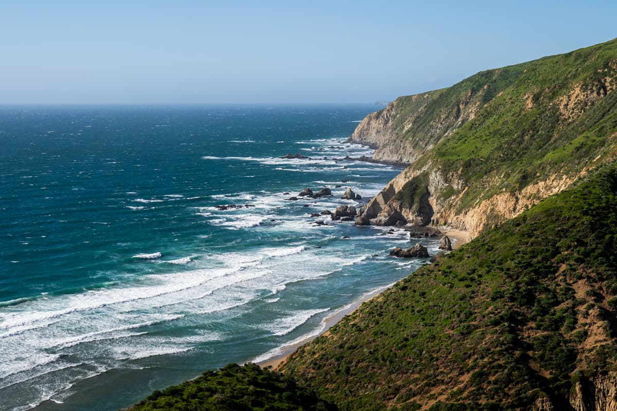 Rugged sea cliffs with the Pacific Ocean in the background along the Tomales Point Trail in Point Reyes National Seashore in California